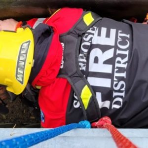 Image portrays rescue personnel rescuing a worker from a confined space trench to present the Crux Rescue Confined Space Rescue Operator training class.