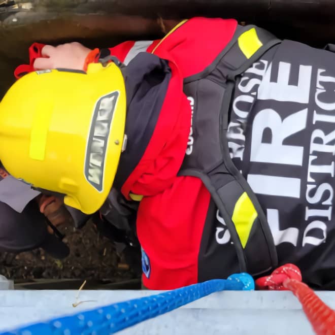 Image portrays rescue personnel rescuing a worker from a confined space trench to present the Crux Rescue Confined Space Rescue Operator training class.